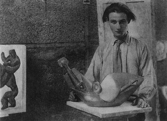 Henri Gaudier-Brzeska with his sculpture ''Bird Swallowing Fish'' in Kettle''s Yard, University of C van English Photographer