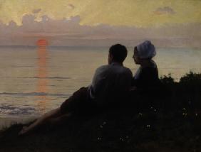 Un couple admirant le coucher du