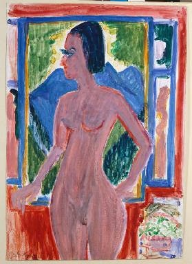 Naked woman at the window