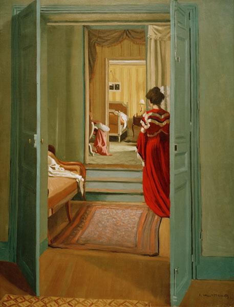 Interior with woman in red - Felix Vallotton