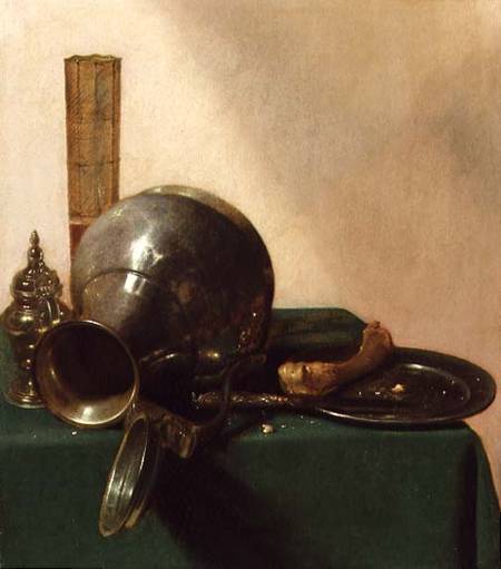 A still life of an overturned jug, a glass of wine, a bone on a plate, all on a green tablecloth van Jan Jansz. den Uyl