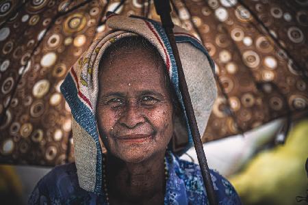 The woman under umbrella