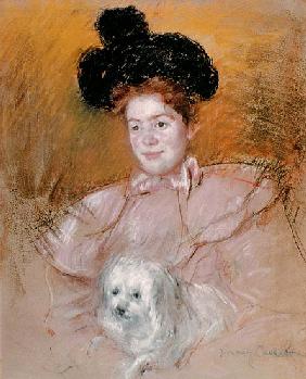 Woman holding a dog