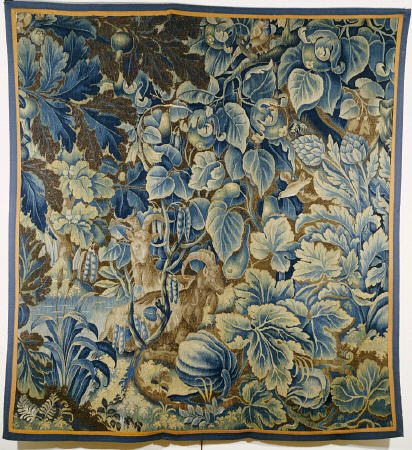 A Feuille De Choux Tapestry Woven In Blue And Brown With Two Goats And Birds Amongst Exotic Gourds A van 