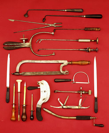 A Selection Of Medical Equipment Including Knives, Saws, Bullet Extractors,  Cauterisers, Lithotrite van 