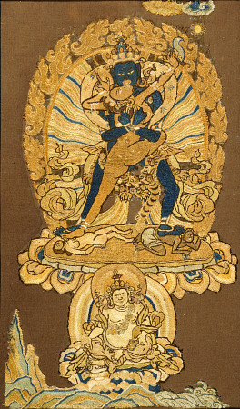 A Tibetan Embroidered Fragment Depicting Samvara Embracing His Consort van 