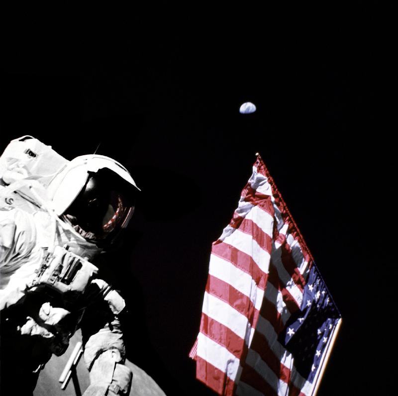 Geologist-Astronaut Harrison Schmitt, Apollo 17 Lunar Module pilot, is photographed next to the Amer van 
