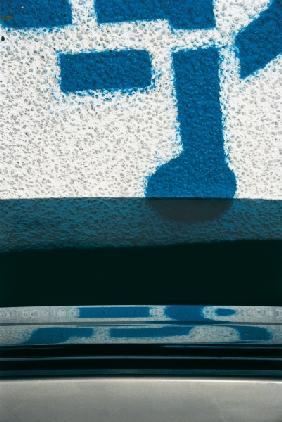 Hieroglyph in a parking lot (photo) 