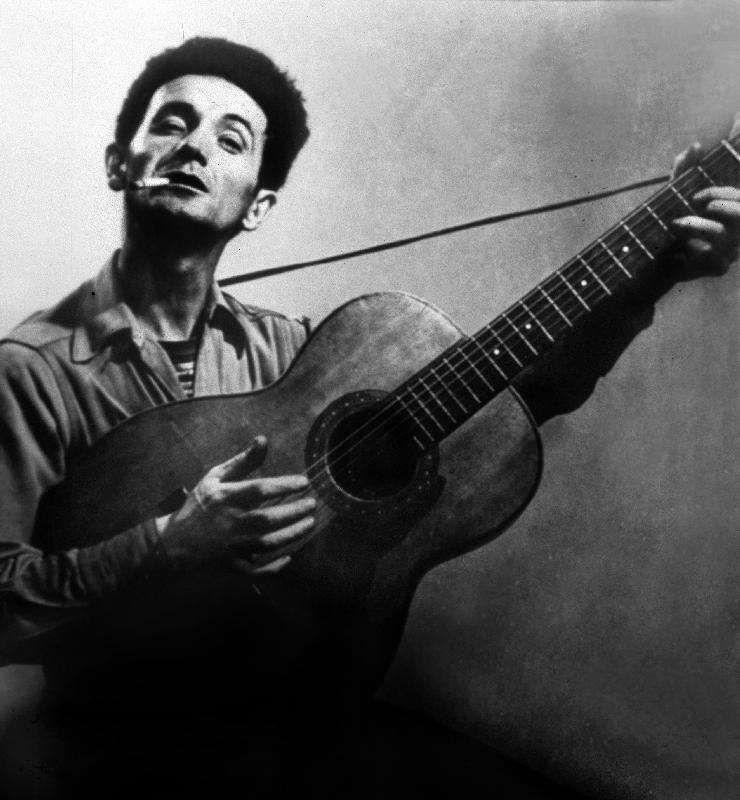 Musician Woody Guthrie considered as the father of folk music van 