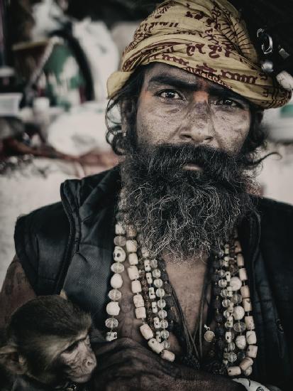 man from ghat with monkey