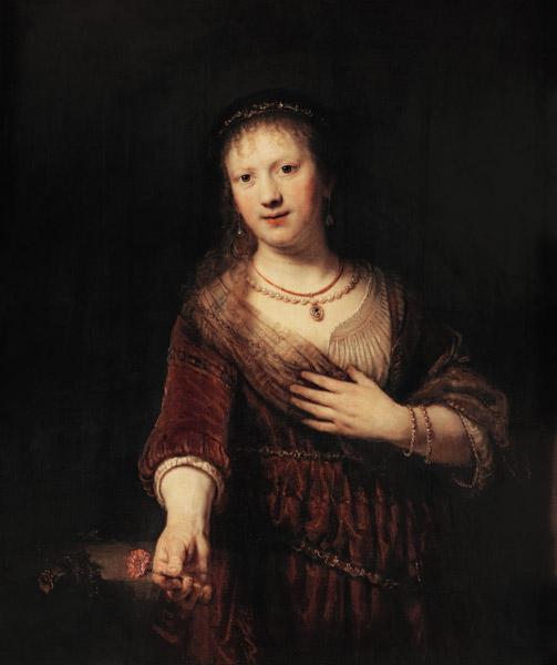 Saskia met een rode bloem Rembrandt van Rijn