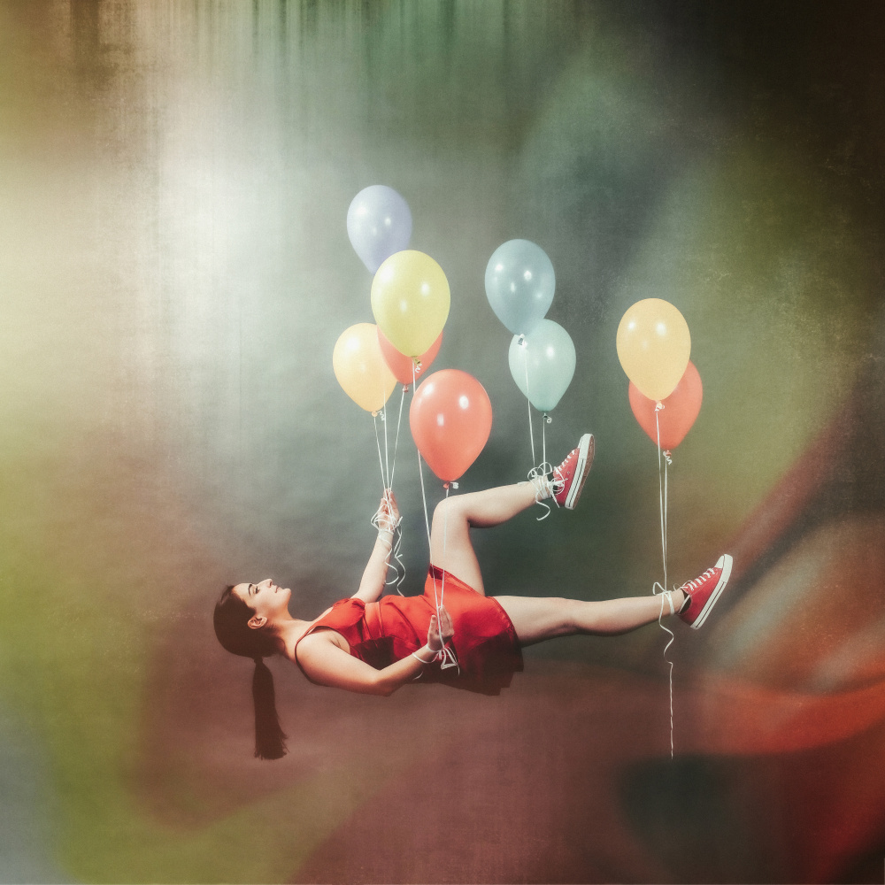 Anna-Valeria with balloons van Stefan Kamenov