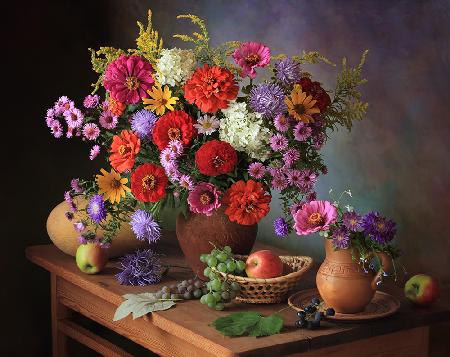 Still life with autumn flowers and fruits