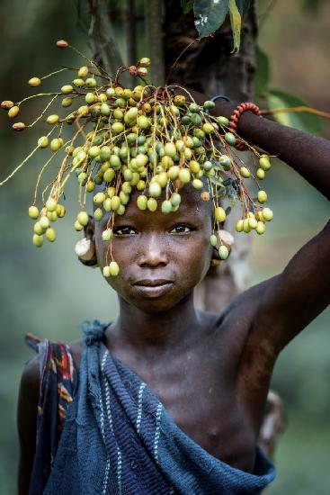 Suri girl adorned